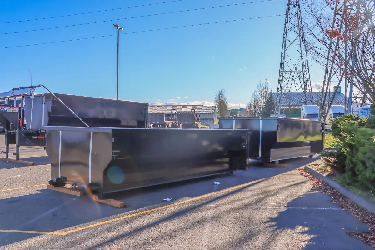 Roll-off dumpster ready for waste disposal at job site for 12 Yard Dumpster Rental in Harrison